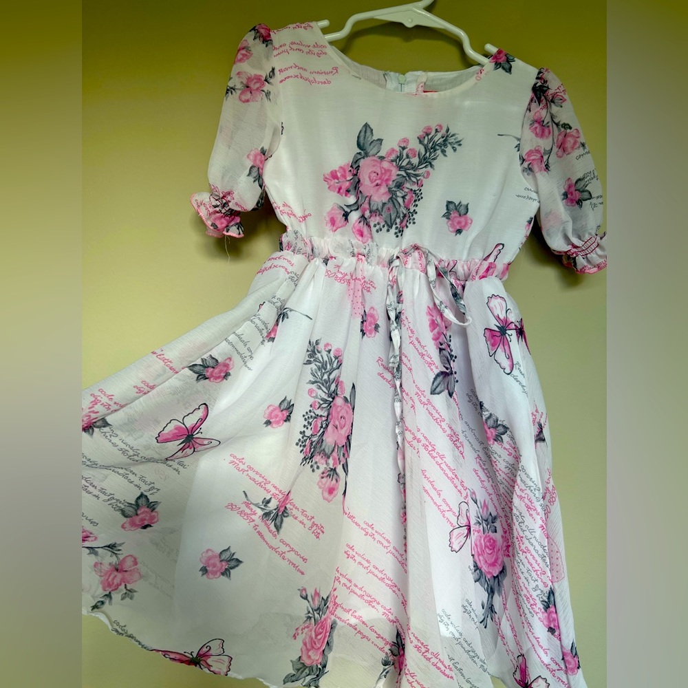 Beautiful chiffon puff sleeve frock with 100% cotton lining. New!